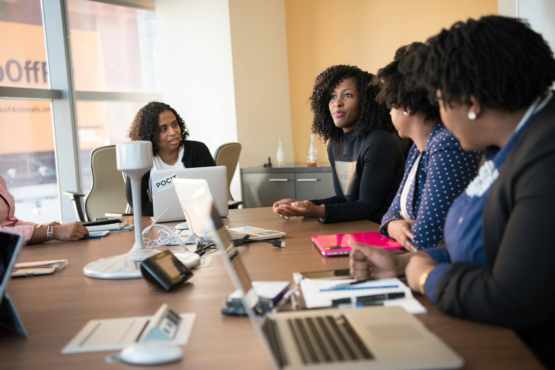 employees gathered on a conference room